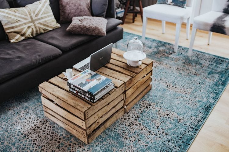 living room upholstery with wooden coffee table on rung